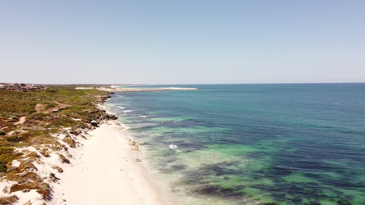 Aerial panning shot left to right above Ocean Reef, Perth in Australia