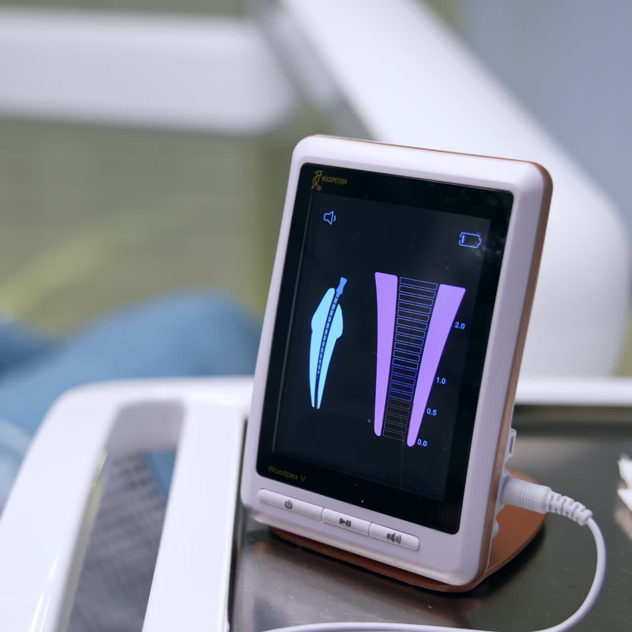 Parameters changing on the sensor screen in dentistry office. Advanced equipment in dental clinics. Close up. Blurred backdrop