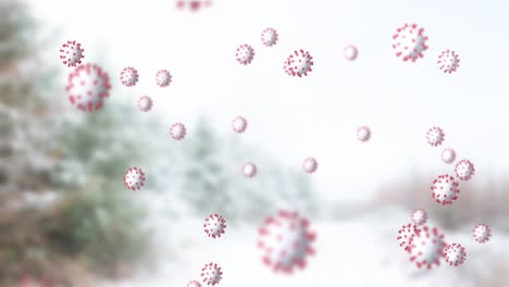 animation of covid 19 cells moving over winter scenery with fir trees in the background