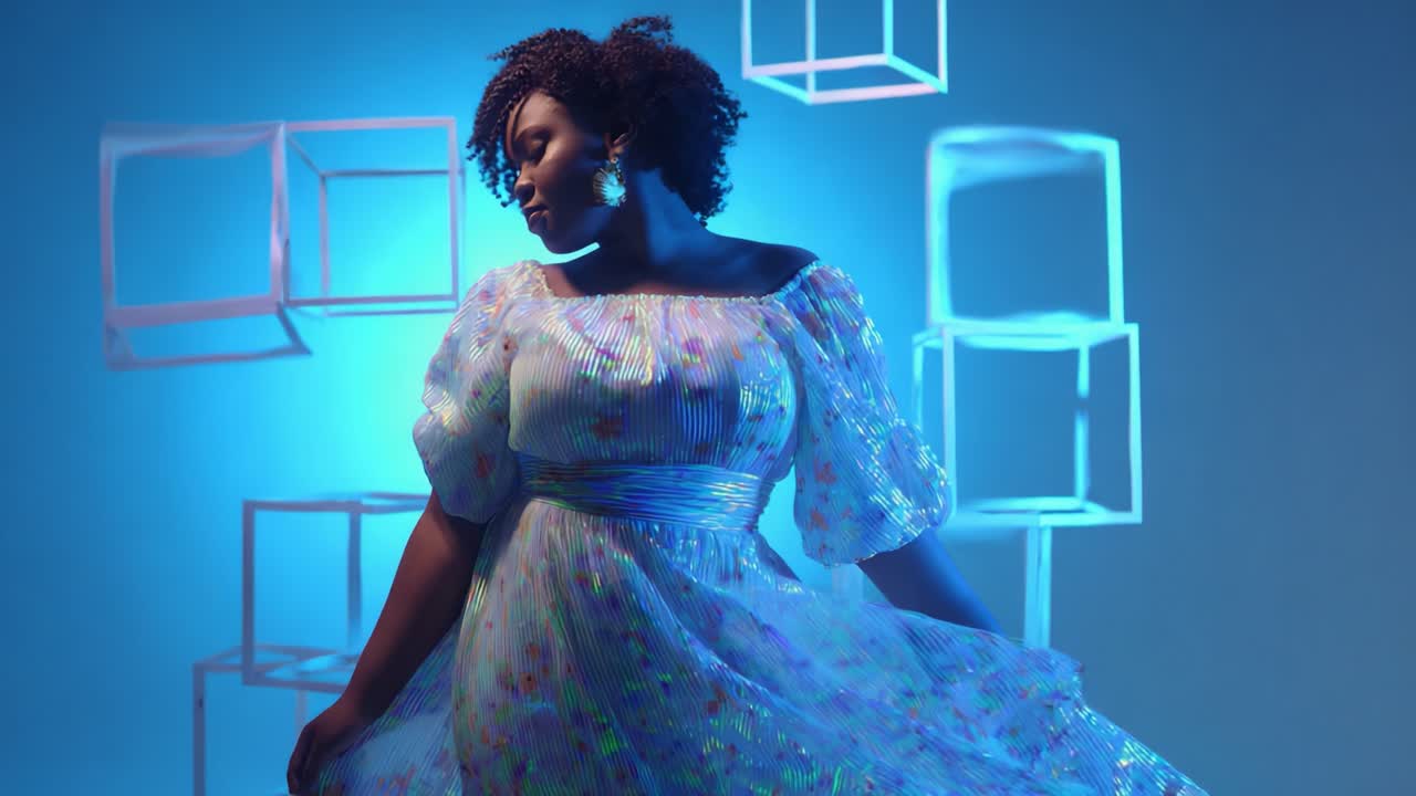 Captivating Fashion Dance Sequence with a Model in a Flowing Iridescent Dress Against a Vibrant Blue Background Featuring Geometric Shapes