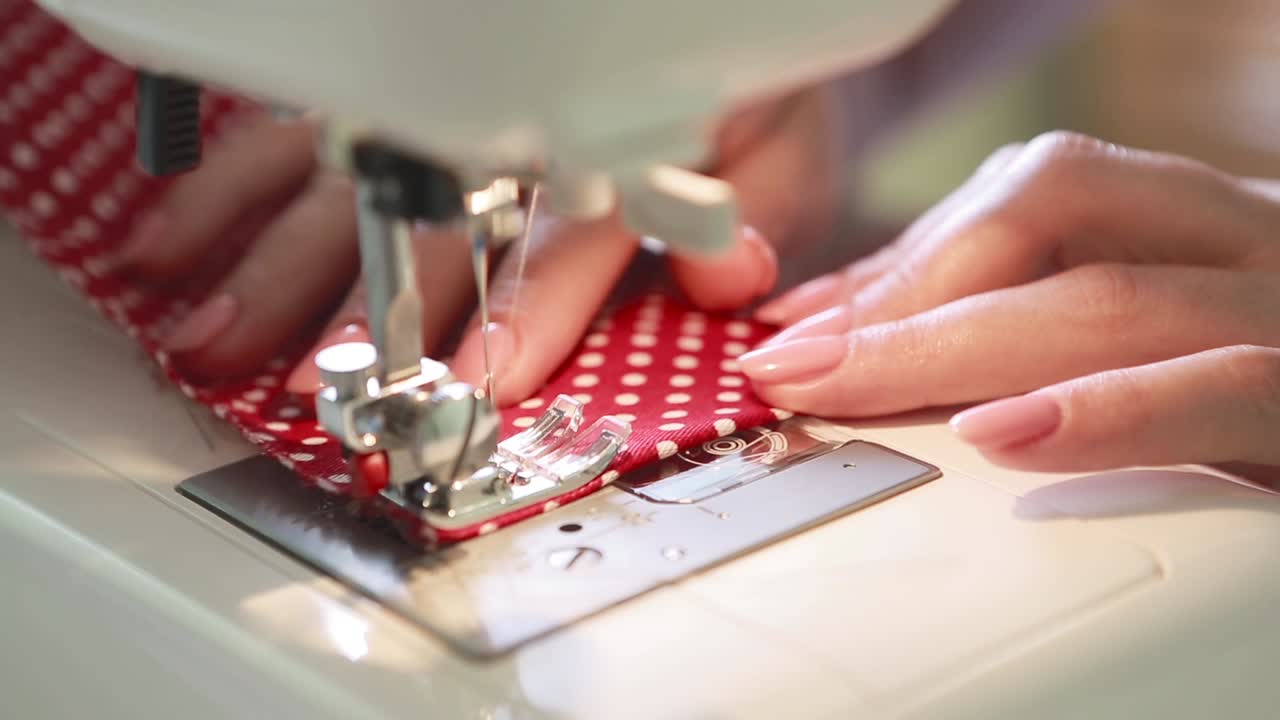 Seamstress Sews Clothes. Creative young fashion design using sewing machine, making clothes