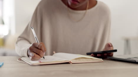 Writing,-phone-and-notebook-with-hands-of-black