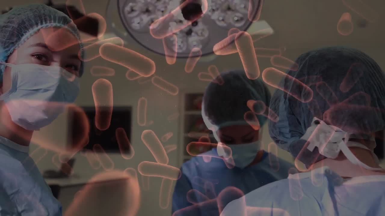 수술 중에 의사 위에 떠다니는 바이러스 세포의 애니메이션