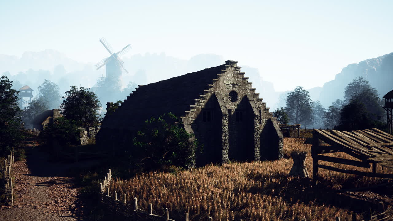 안개가 가득한 풍경 속의 중세 마을