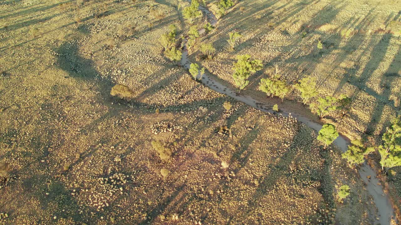 Close aerial footage of a small creek near Kings Canyon, Watarrka. Northern Territory, Australia. August 2022