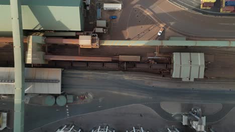 cargo train wagons loaded with iron in esperance port, western australia