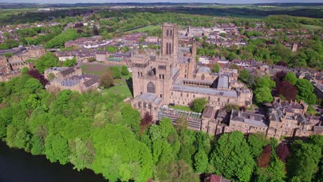 High-drone-shot-flying-right-above-Durham-Cathedral-on-a-sunny-day,-County-Durham,-UK