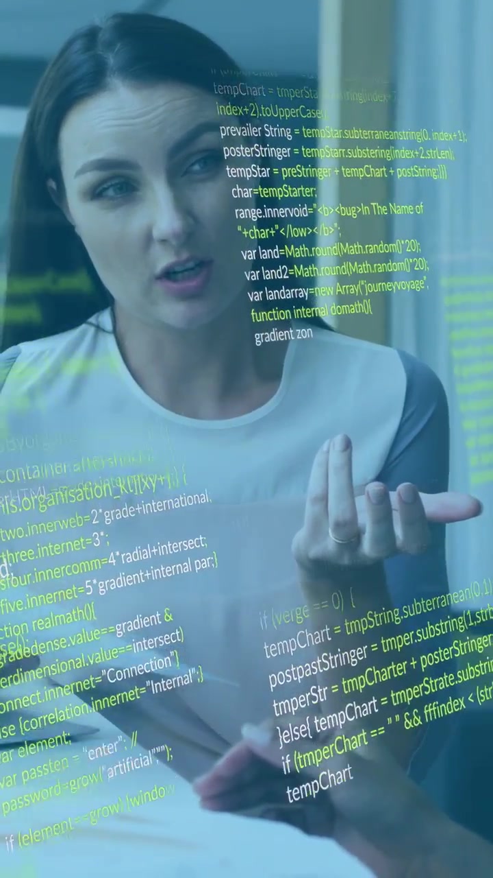 Vertical video: Woman reading doc, gesturing while peer pointing, code overlay tying talk to tech