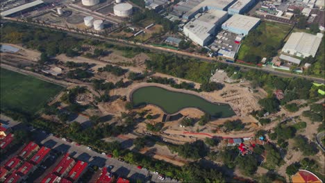 Drone-view-of-unfinished-city-park-construction-and-Residential-area-in-Mexico