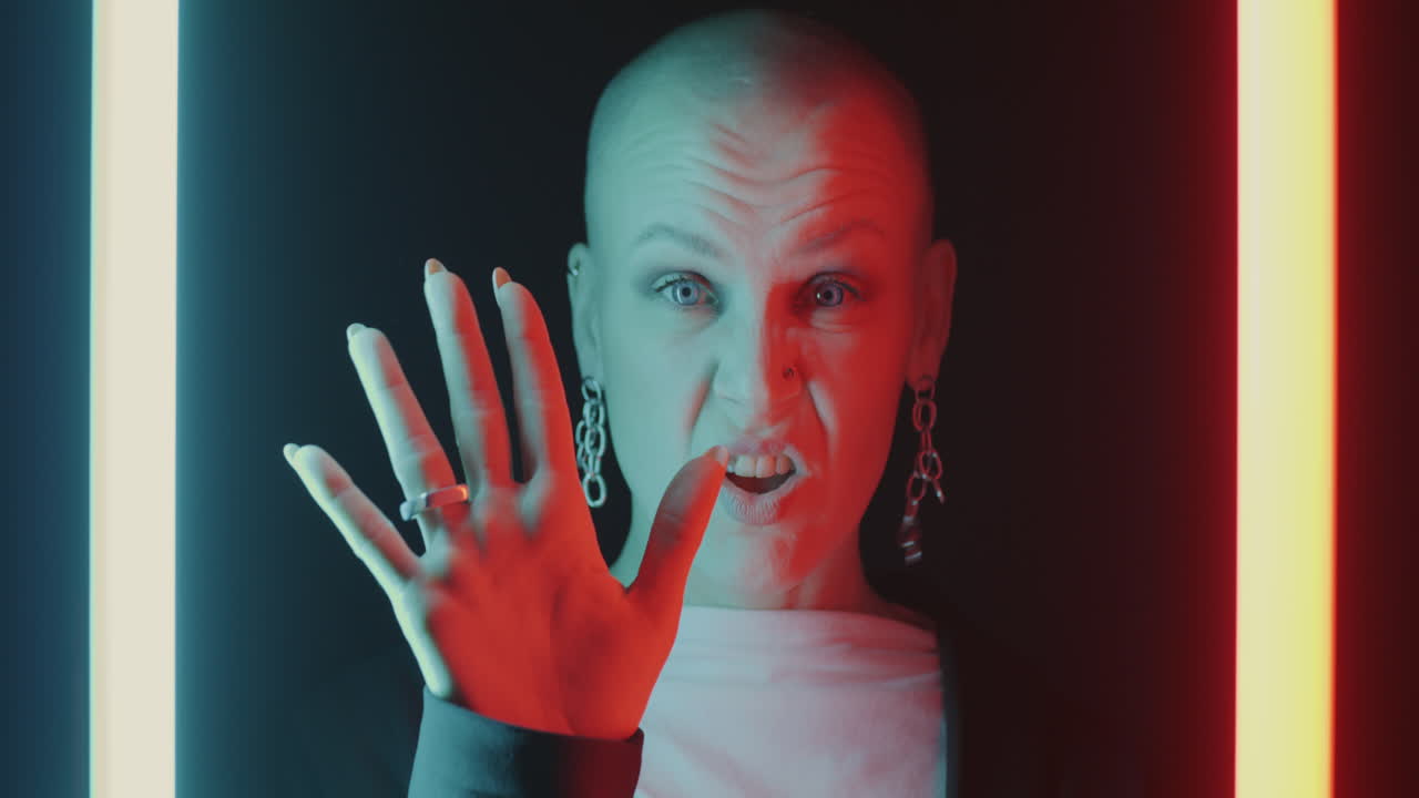 Bald Woman with Neon Light Backdrop