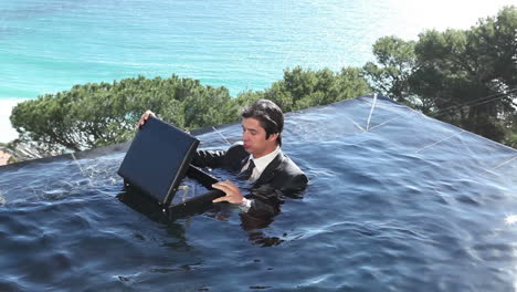 a businessman wearing a suit in a pool