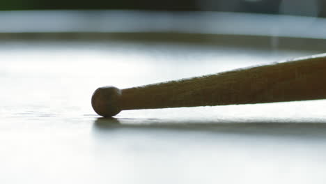 close-up of a drumstick on a surface