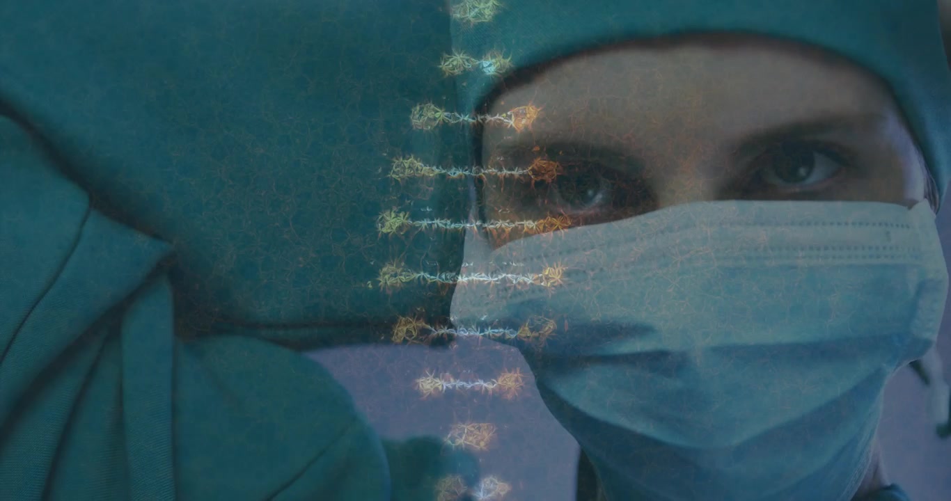 Animation of dna strand over caucasian female surgeon in face mask