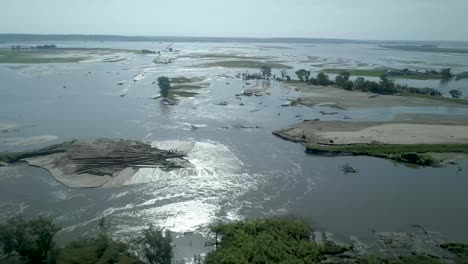 river levee breach causing flooding