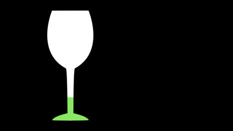 weinglas mit grüner farbe gefüllt