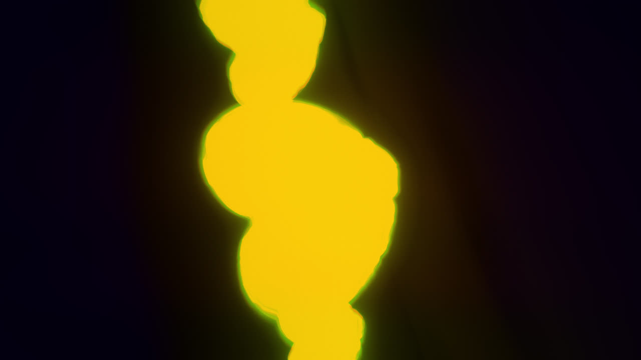 Yellow energy heart shapes on a dark background