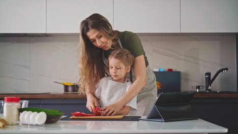 mother holds her daughter's hand