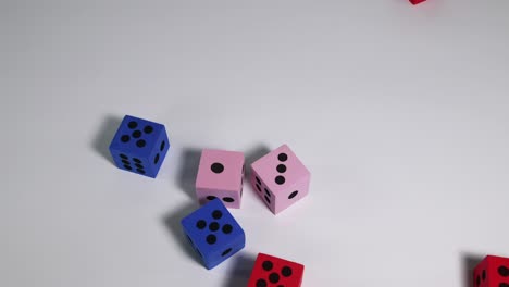 dice in motion falling against white background