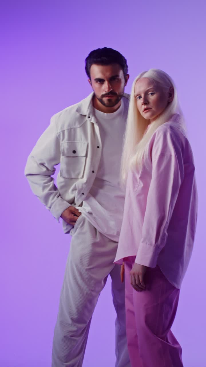 Fashionable couple in studio portrait