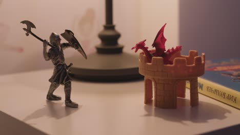 toy knight vs. dragon