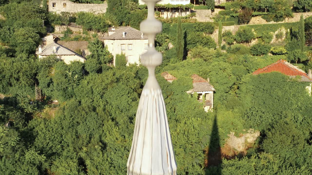 Wide angle tilt up shot of the top portion of Mosque of Pocitelj, in mostar city of Bosnia and Herzegovina during the day