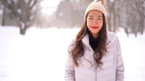 beautiful asian woman travel smile happy in snow winter season hokkaido japan