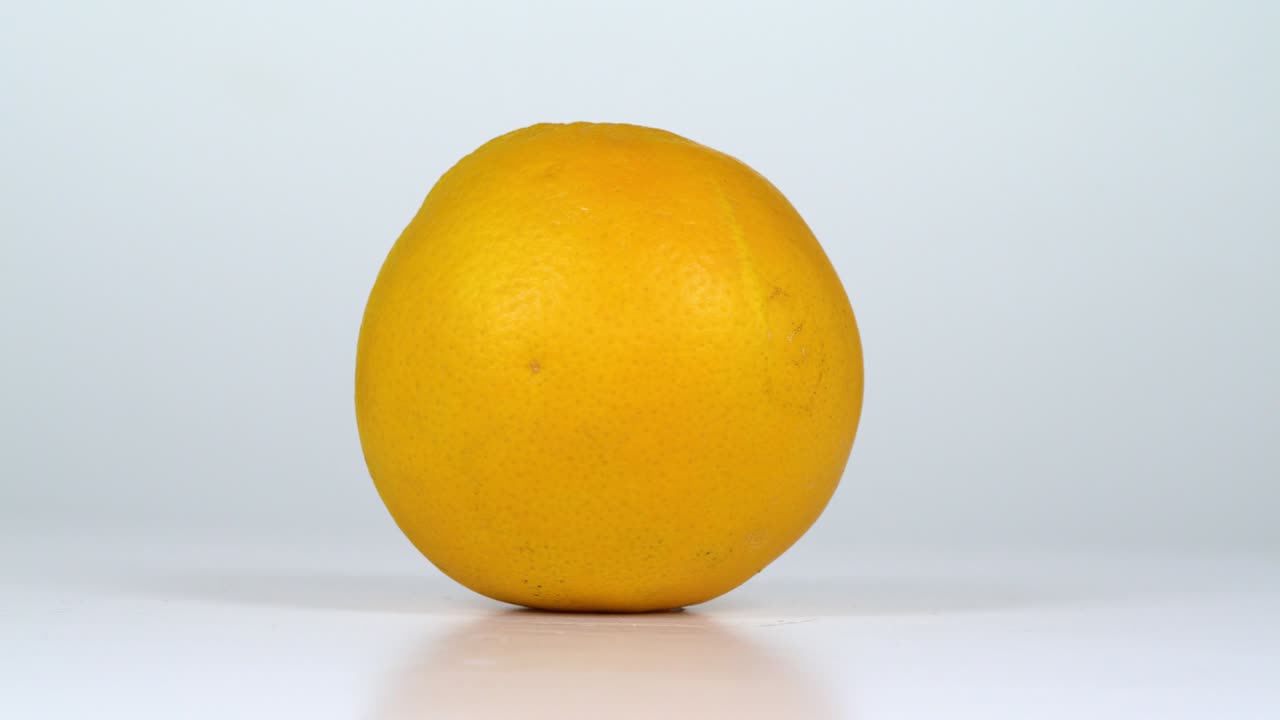 Orange rotating seamless loop white background