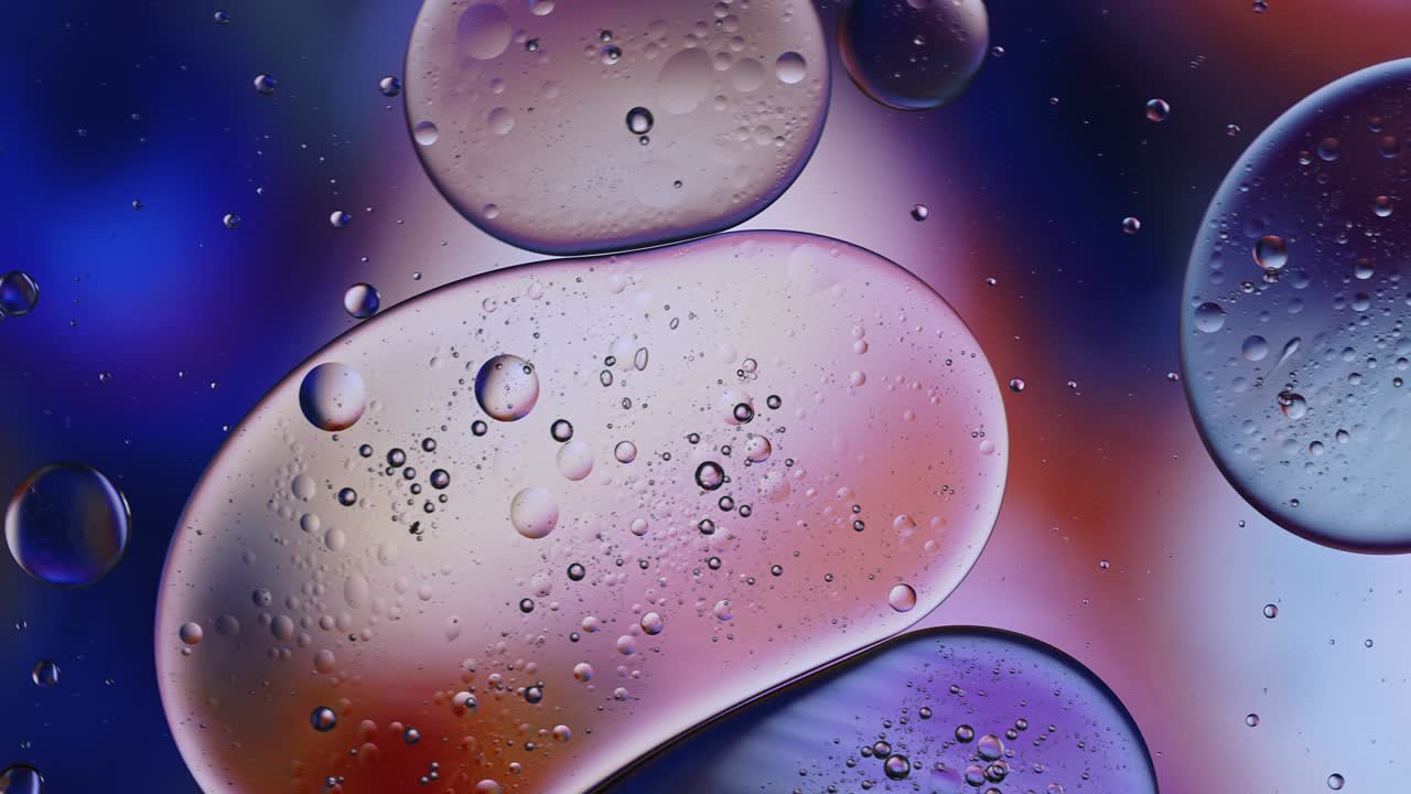 Abstract Colorful Food Oil Drops Bubbles and spheres Flowing