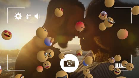 iconos de emoji sobre una foto de una pareja abrazándose