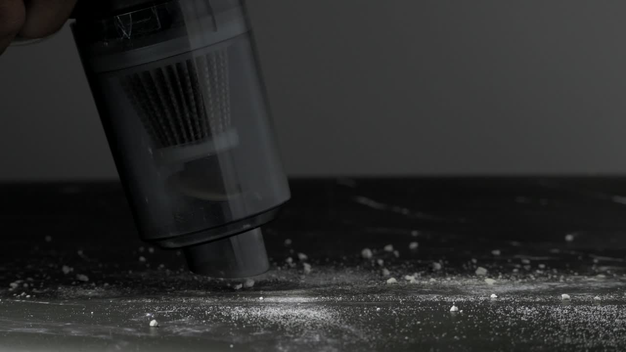 vacuum cleaner for white powder cleaning slowmotion.