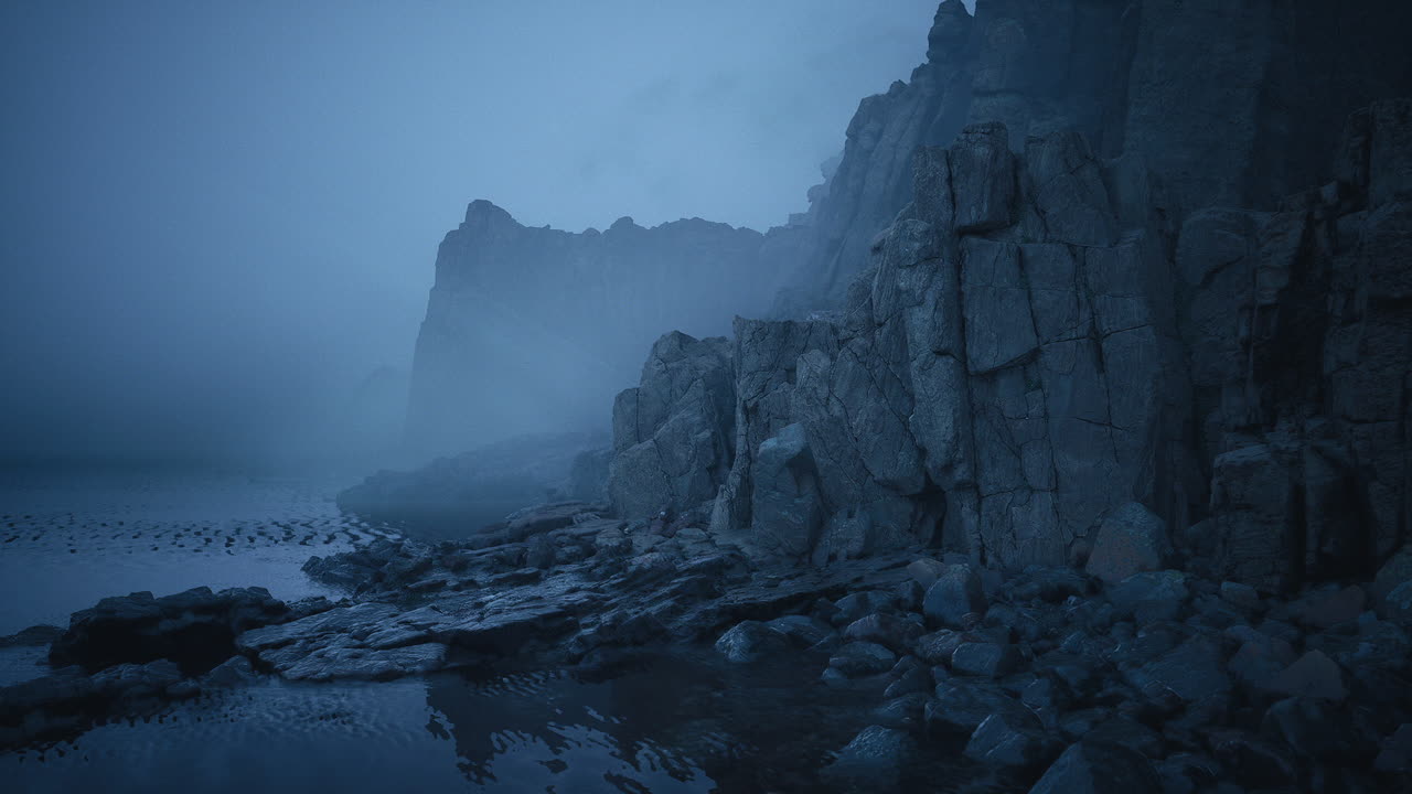 Scenic coastal cliffs shrouded in mist during twilight hours