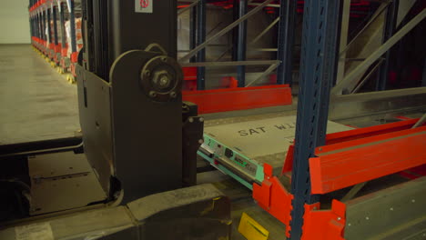 automated warehouse storage system with forklift and agv