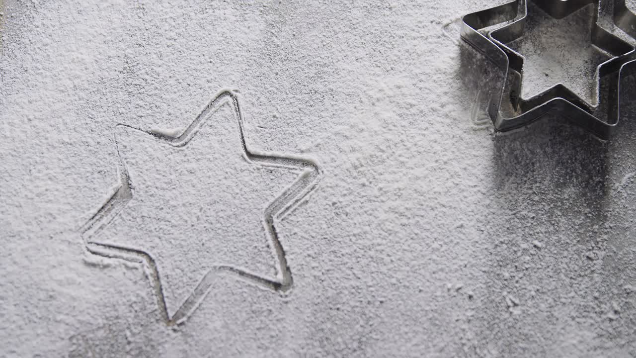 cortador en forma de estrella en la harina 4k