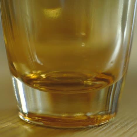 beer is poured in a glass