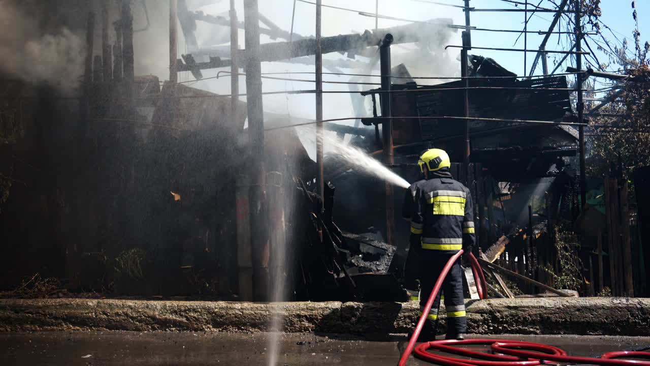 Firefighters trying to extinguish a house on fire