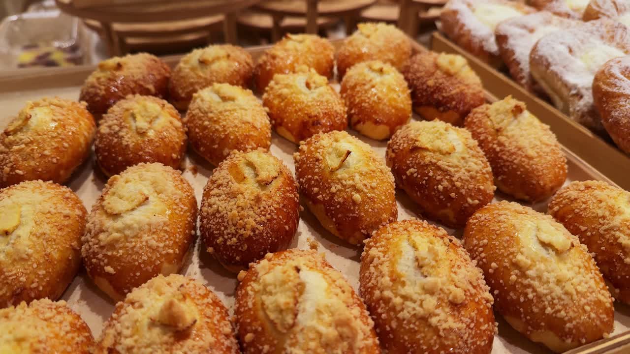Selection of pastries on a wooden tray
