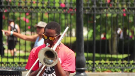 young musicians playing brass instruments outdoors