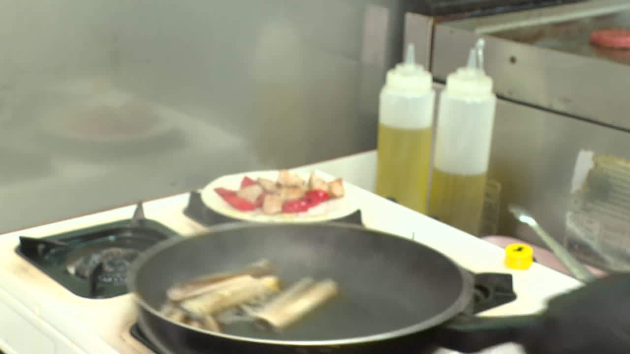 Cooking Meat and Seafood in a Kitchen