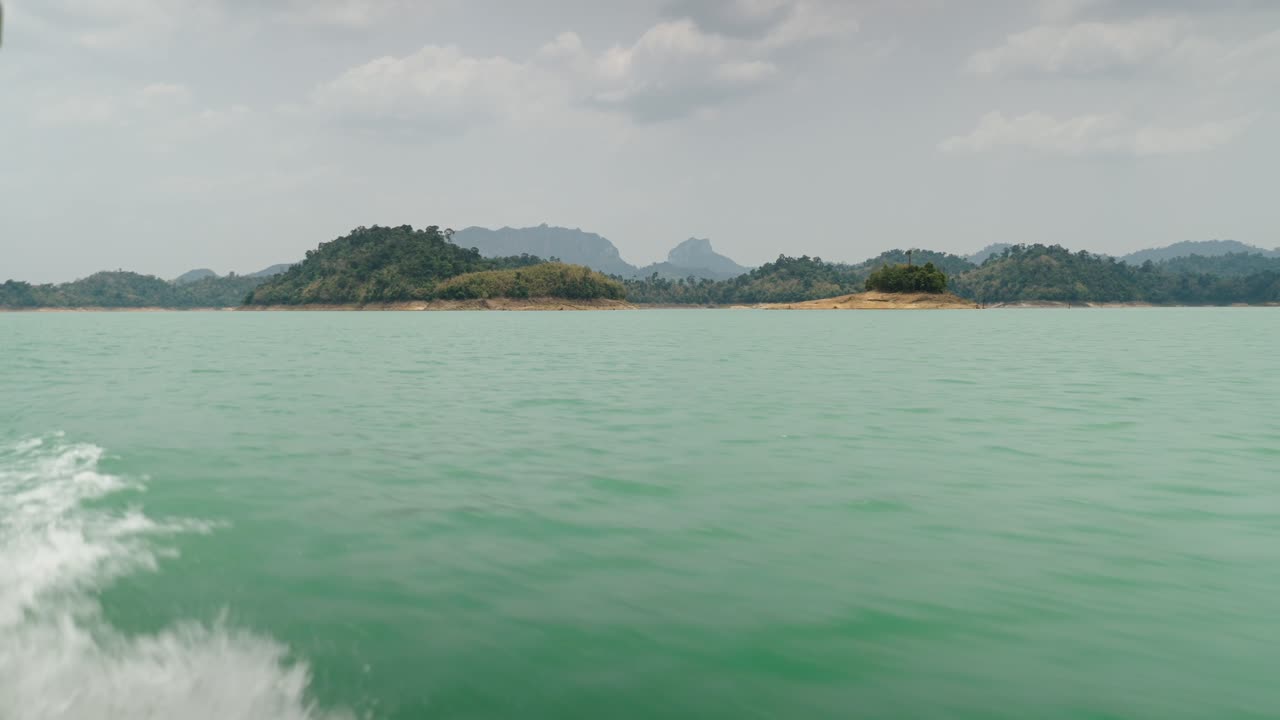 Scenic Turquoise Lake with Islands and Mountains