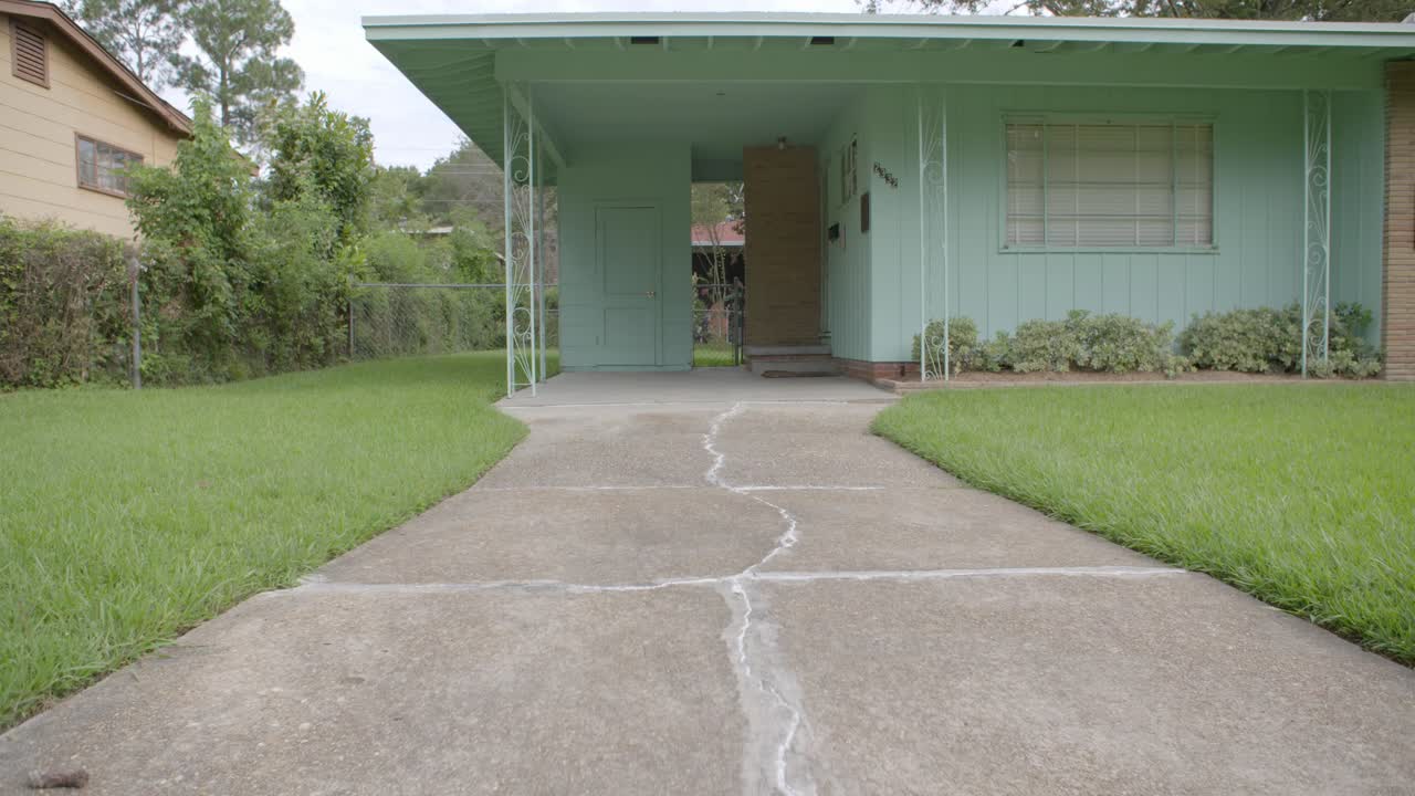Wide, driveway: Civil rights leader Medgar Evers home. Site of his assassination. Jackson, Mississippi.