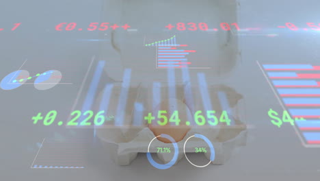speckled brown egg being showcased in pulp carton, showing floating green financial charts