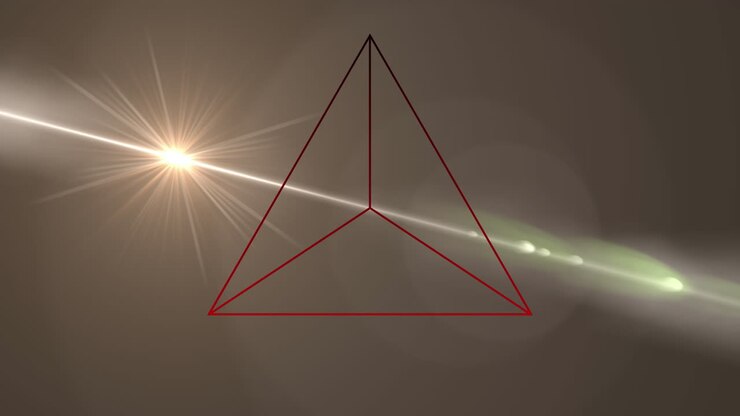 Animation of light spots and shapes on black background