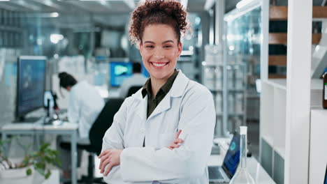 smiling female scientist in a lab