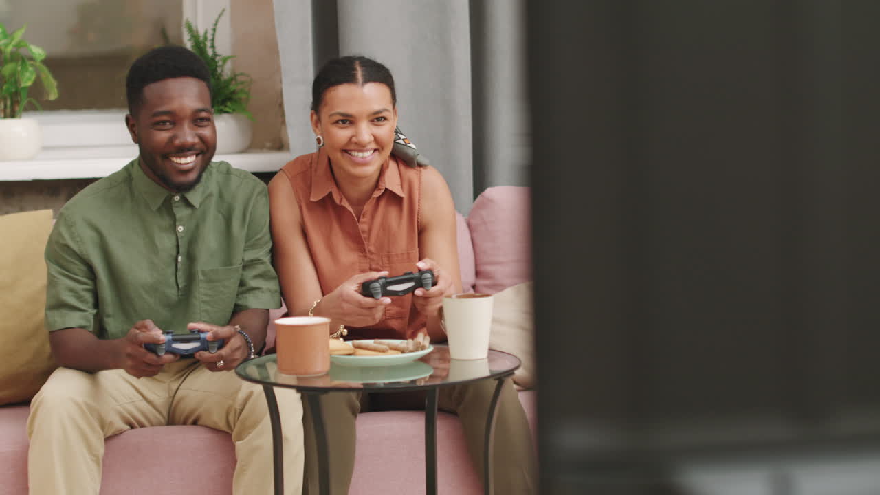 Young Biracial Couple Playing Video Games