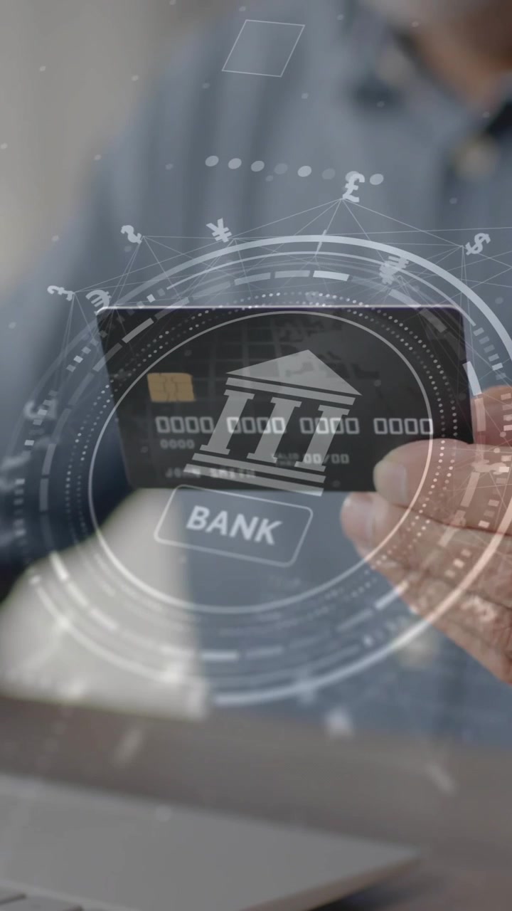 Animation of currency icons and data over man paying online with card