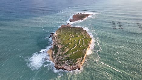 drone panning around the saint paul's islands at sunrise in malta