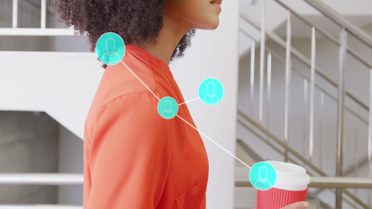 Animation of networks and data processing over african american businesswoman in office