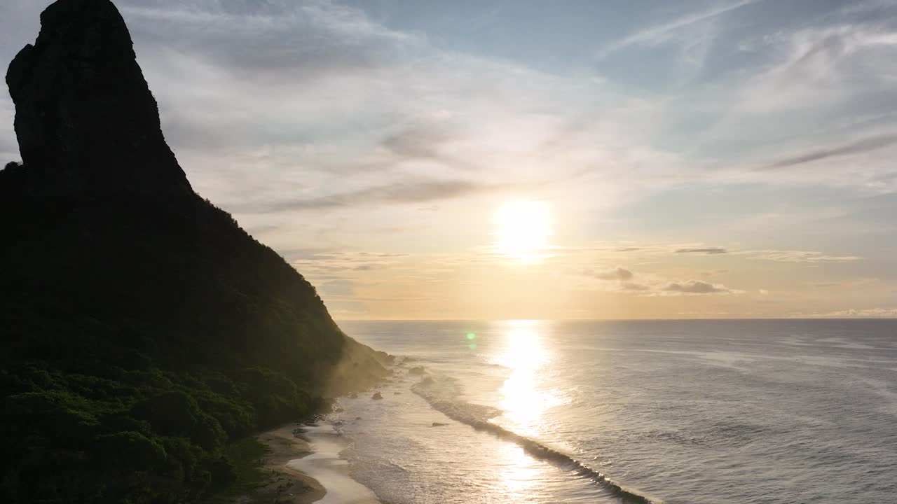Sunset bay water archipelago of Fernando de Noronha at brazilian atlantic ocean Brazil. Sunset paradise islands at Fernando de Noronha archipelago. Sunset summer travel. Tropical destinations.
