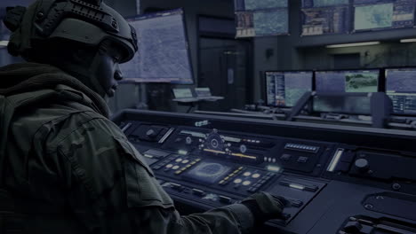 soldier operating a high-tech tactical command center