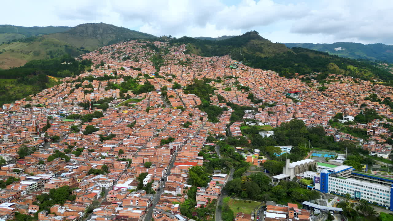 Aerial drone view of Medellin, historic hillside town in Colombia in daylight